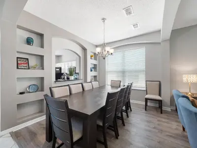 a dining room with a table and chairs at bsv_villa2633 in Kissimmee