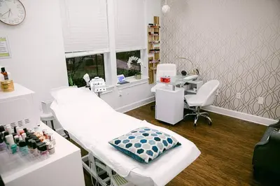 a hospital room with a patient bed and a table at ABC Vacation Homes in Kissimmee
