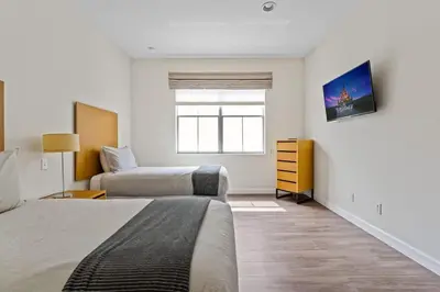 a bedroom with two beds and a window at 4 BR Hot Tub Cozy Decor @ Regal Oaks RO2761N in Kissimmee