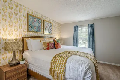a bedroom with a bed and a window at 8575 - 7th Heaven Villa in Kissimmee