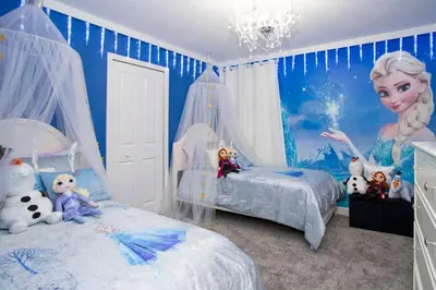 a childs bedroom with a mermaid wall mural at Storey Lake House 2713 in Kissimmee