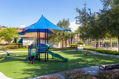 a playground with a slide in a park at Remodeled Gem - Comfort & Location in Kissimmee