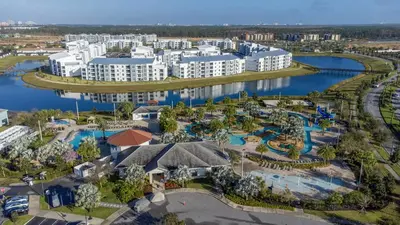 an aerial view of a resort with a water park at Townhome with pool at Storey Lake in Kissimmee