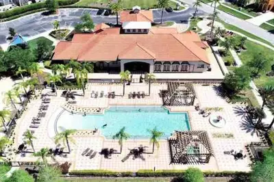 an aerial view of a resort with a swimming pool at Remarkable Cozy 4Bed-3Ba Townhouse in Kissimmee