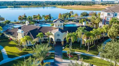 an aerial view of a house with a lake at Central Elegance-Spacious Beautifully Decor Condo in Orlando
