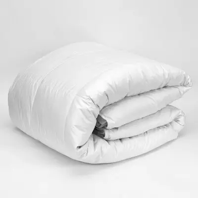 a stack of white pillows on a white background at DisneyResortVillas by AmericanVacationLiving 1 BR in Orlando