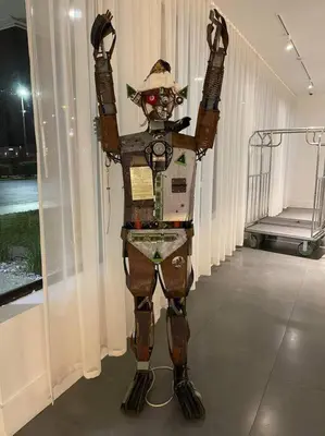 a robot is standing in a room at Newly renovated room in cozy hotel near Disney 2 in Kissimmee