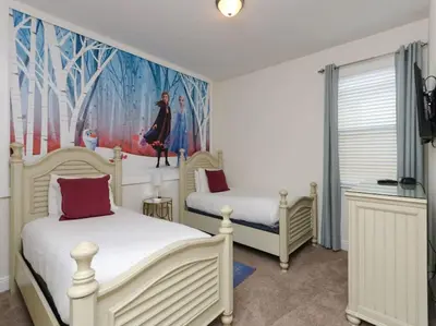 a bedroom with two beds and a painting on the wall at Gorgeous Remo 8 BR at Encore Resort next to Disney in Orlando