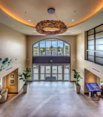 a large room with a large lobby with a chandelier at Gorgeous Remo 8 BR at Encore Resort next to Disney in Orlando