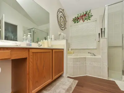 a bathroom with a sink and a tub and a shower at No place like home in Oviedo