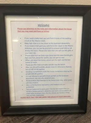 a picture of a document in a framed picture at NEW awesome dream house, 5 Min to Disney in Orlando