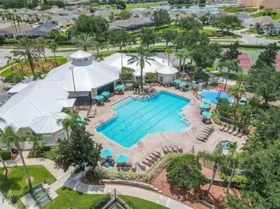an aerial view of a pool at a resort at Windsor Palms, next to clubhouse in Kissimmee