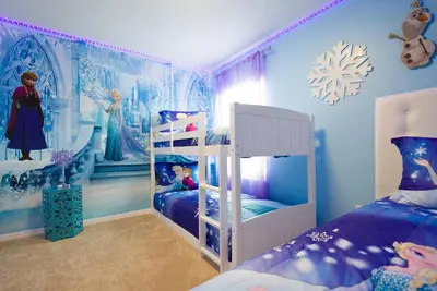 a room with two bunk beds and a snow covered wall at Great 6bedrooms home in Kissimmee w Private Pool 8426 in Kissimmee