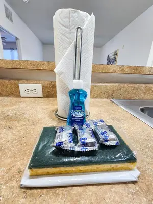 a bottle of colgate toothpaste sitting on a counter at Retreat at Secret Lake 10 mins to Disney in Kissimmee