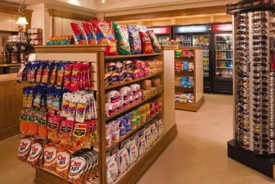 a store aisle with a display of potato chips at Bonnet Creek 2 Bedroom Deluxe in Orlando
