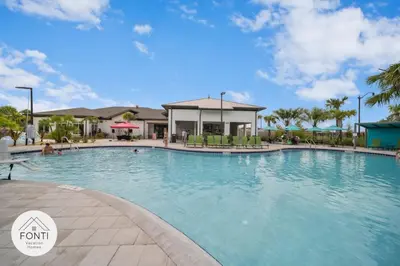 a large swimming pool at a resort at NEW! House in Resort Waterpark Disney Orlando 2693 in Kissimmee