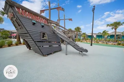 a playground with a slide in a park at NEW! House in Resort Waterpark Disney Orlando 2693 in Kissimmee