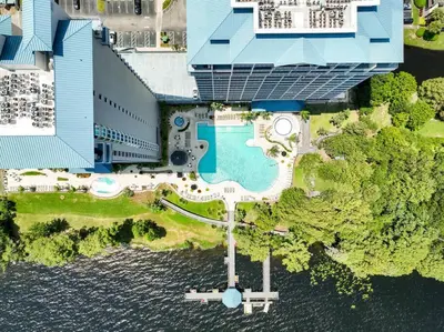 an aerial view of a resort with a swimming pool at Orlando Apt 9th Floor 5 min from Disney in Orlando