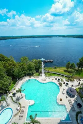 an aerial view of a resort with a large swimming pool at Orlando 5th Floor 5 min from disney in Orlando
