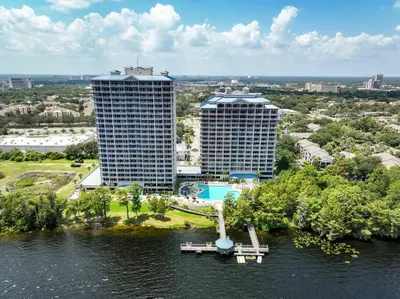 an aerial view of two tall buildings on the water at Orlando 5th Floor 5 min from disney in Orlando