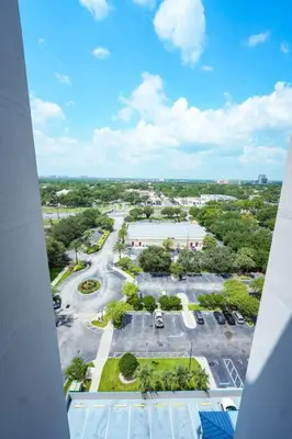 an aerial view of a parking lot in a city at Apartment 5 min away from Disney 1st Floor in Orlando