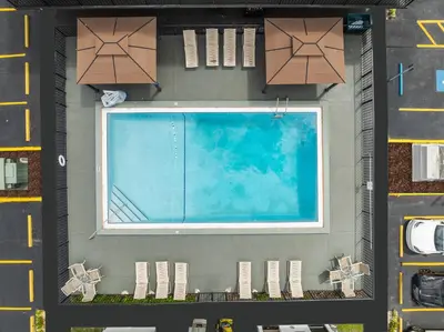 an overhead view of a swimming pool on a building at Baymont by Wyndham Orlando Downtown in Orlando