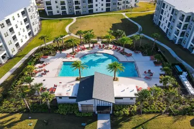 an overhead view of a pool at a resort at The Epic Miami Supreme Storey Lake in Kissimmee