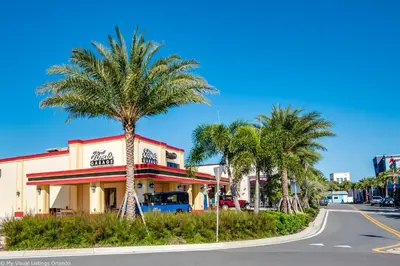 a palm tree in front of a fast food restaurant at 2959 Castaway Lane in Orlando