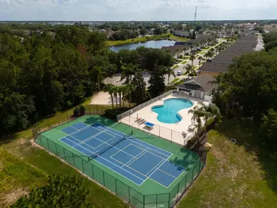 an overhead view of a tennis court at a resort at The Dream Vacation Home! in Orlando