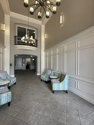 a large lobby with couches and a chandelier at Vista Cay Hideway Luxury Home By Universal Orlando in Orlando