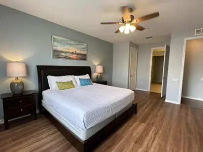 a bedroom with a bed and a ceiling fan at Vista Cay Hideway Luxury Home By Universal Orlando in Orlando