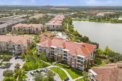 an aerial view of a resort with a lake at Vista Cay Getaway Luxury By Universal Orlando in Orlando