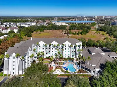 an aerial view of a resort with a pool at HSO - Family Apartments Close to Disney World & Universal in Orlando
