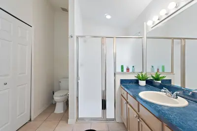 a bathroom with a sink and a toilet at Star Oasis at Citrus Ridge by Shine Villas 091 villa in Orlando