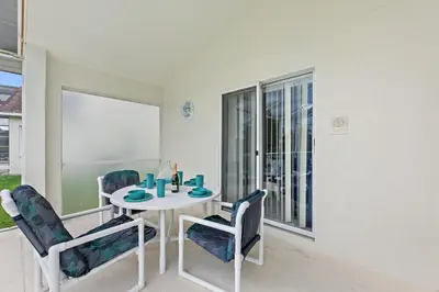 a dining room with a table and chairs and a window at Star Oasis at Citrus Ridge by Shine Villas 091 villa in Orlando