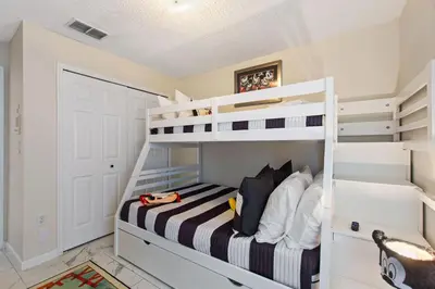a bedroom with a bunk bed with two bunk beds at Star Oasis at Citrus Ridge by Shine Villas 091 villa in Orlando
