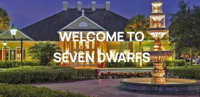 a building with a sign that reads welcome to seven wonders at Awesome 3 beds Villa at Seven Dwarfs in Kissimmee
