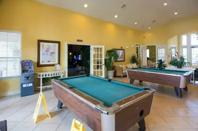 a living room with a pool table in it at Awesome 3 beds Villa at Seven Dwarfs in Kissimmee