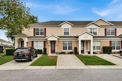 a car parked in front of a house at 2319 Silver Palm in Kissimmee