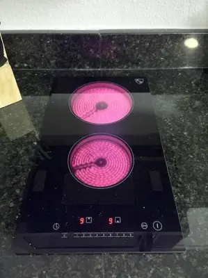 a stove with two pink lights on top of it at 1 BD Apt close to Disney/Universal/Shopping/Dining in Kissimmee