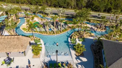 an overhead view of a pool at a resort at Luxury 4Bed Near Disney, FreeVIP Resort 4335 in Kissimmee