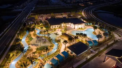 an overhead view of a resort at night at Stylish home Near Disney Free Waterpark 4407 in Kissimmee