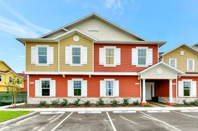 a house with an orange at New Towhouse 2025 in Orlando