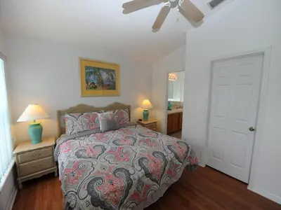 a bedroom with a bed and a ceiling fan at Three-Bedroom House in Clear Creek in Orlando