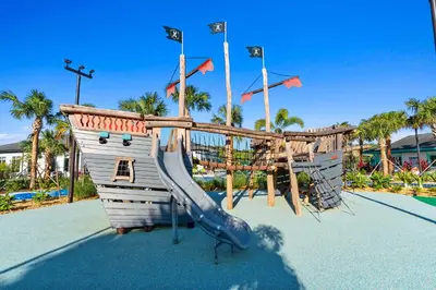 a playground with a slide at a resort at 2452 Reading Trail in Kissimmee