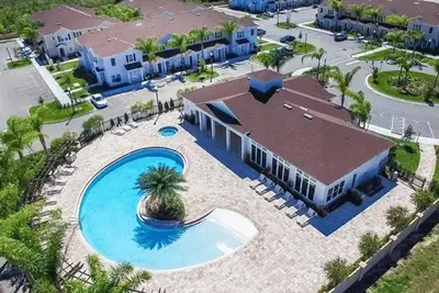 an aerial view of a pool at a resort at New in the market townhouse in West Lucaya! in Kissimmee