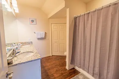 a bathroom with a sink and a shower at New in the market townhouse in West Lucaya! in Kissimmee