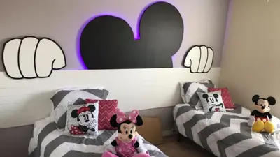 a bedroom with two beds with stuffed animals on them at Private Pool Townhome at Paradise Palms Resort in Kissimmee