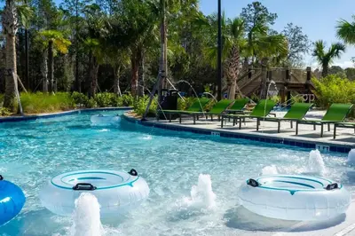 a pool at a resort with a water park at Wonderful 5 Bd w Pool @ Storey Lake Resort 2545 in Kissimmee