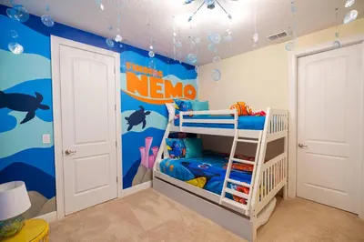 a childs room with a nemo mural on the wall at Stunning Luxury 9BR Encore Villa by Disney in Orlando